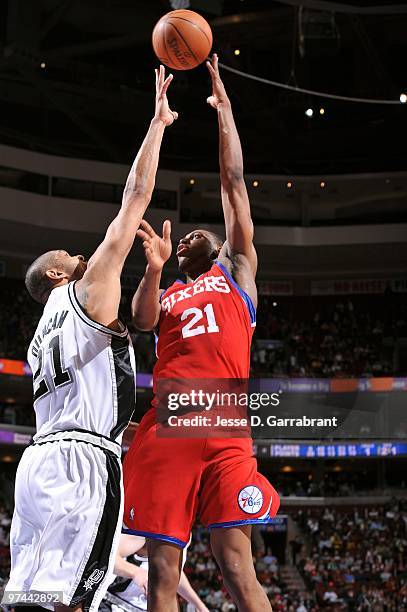 Thaddeus Young of the Philadelphia 76ers goes up for a shot against Tim Duncan of the San Antonio Spurs during the game at Wachovia Center on...