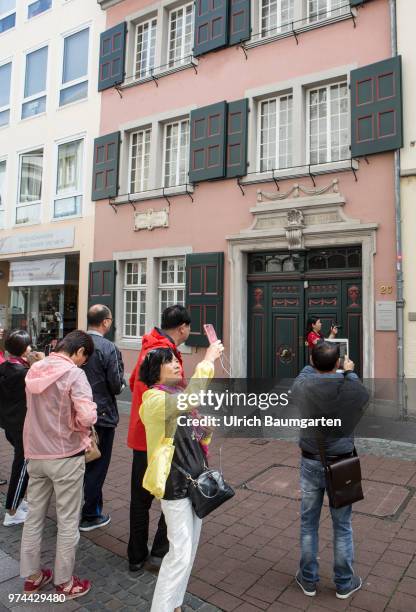 Bonn at the Rhine river, the former federal capital and since the move of the federal government to Berlin, federal city. Asian tourists in front of...