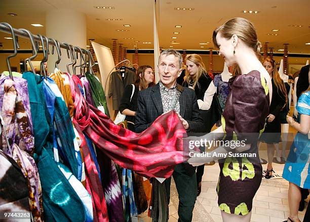 Barneys creative director Simon Doonan and actress Melissa George promote the Lauren Pierce Atelier collection at Barneys New York on March 4, 2010...