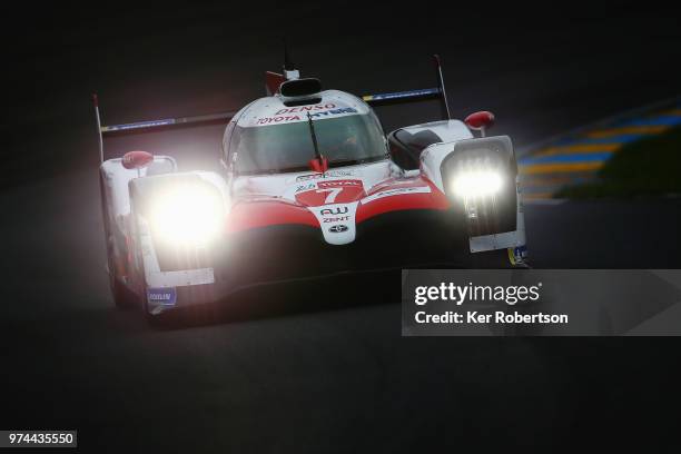 The Toyota Gazoo Racing TS050 Hybrid of Mike Conway, Kamui Kobayashi and Jose Maria Lopez drives during qualifying for the Le Mans 24 Hour race at...