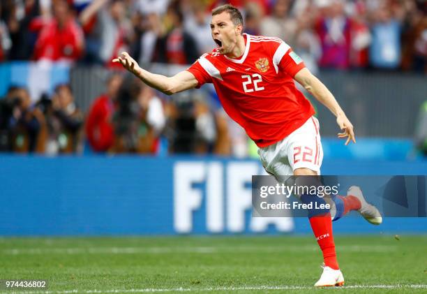 Artem Dzyuba of Russia celebrates after he scores his team's third goal during the 2018 FIFA World Cup Russia group A match between Russia and Saudi...