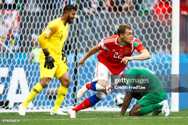 Artem Dzyuba of Russia celebrates after he scores his team's third goal during the 2018 FIFA World Cup Russia group A match between Russia and Saudi...