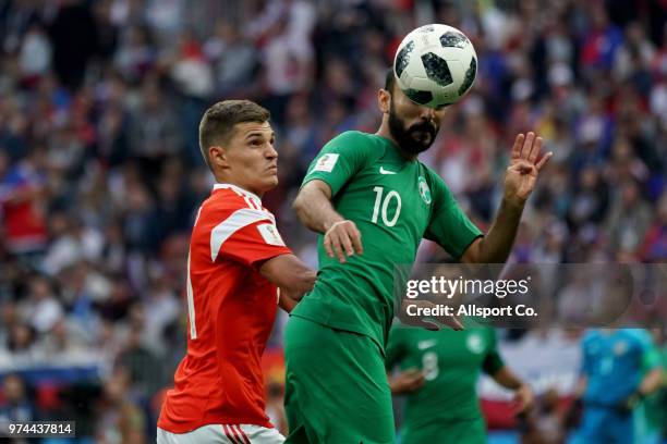 Mohammed Al-Sahlawi of Saudi Arabia heads the ball during the 2018 FIFA World Cup Russia group A match between Russia and Saudi Arabia at Luzhniki...