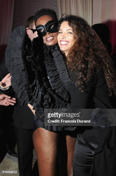 Grace Jones and Nadia Fares attend the Victor & Rolf 'Flower Bomb' 5th Anniversary during Paris Fashion Week at Hotel Meurice on March 4, 2010 in...