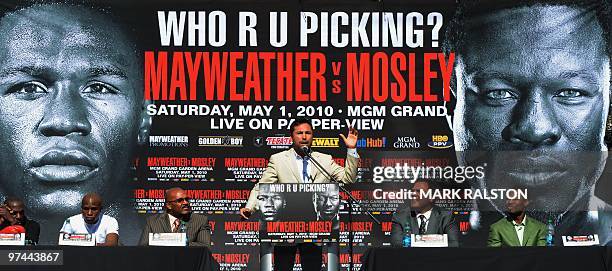 Promoter and former world champion boxer Oscar De La Hoya announces the Floyd Mayweather and Shane Mosley May 1 fight during their joint press...