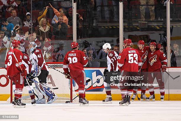 Lee Stempniak of the Phoenix Coyotes celebrates with teammates Keith Yandle, Vernon Fiddler, Derek Morris and Lauri Korpikoski after Stempniak scored...