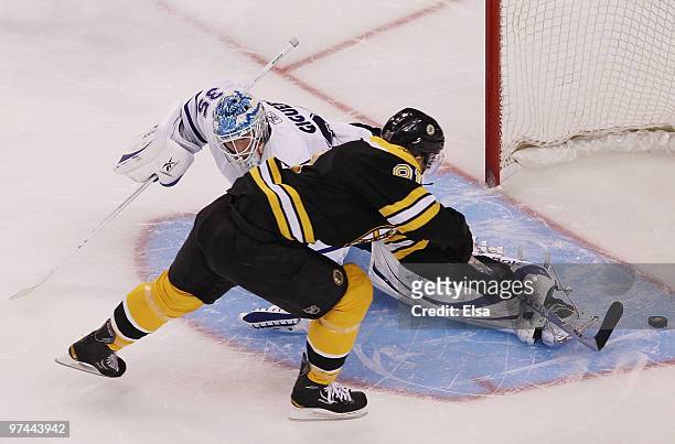 Mirslav Satan of the Boston Bruins scores the game winning goal in the overtime shootout past Jean-Sebastien Giguere of the Toronto Maple Leafs on...
