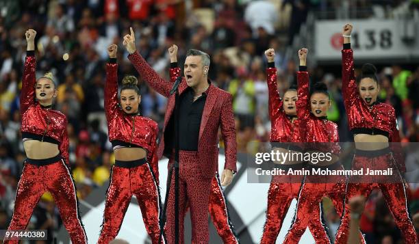 Robbie Williams entertains the crowd in the opening ceremony before the 2018 FIFA World Cup Russia group A match between Russia and Saudi Arabia at...