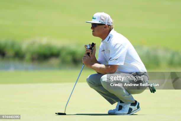 Charley Hoffman of the United States lines up a putt on the sixth green during the first round of the 2018 U.S. Open at Shinnecock Hills Golf Club on...