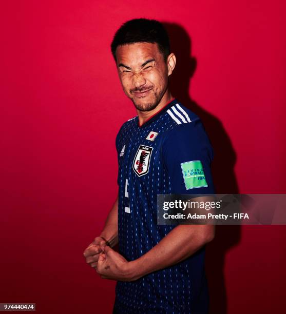 Shinji Okazaki of Japan poses for a portrait during the official FIFA World Cup 2018 portrait session at the FC Rubin Training Grounds on June 14,...