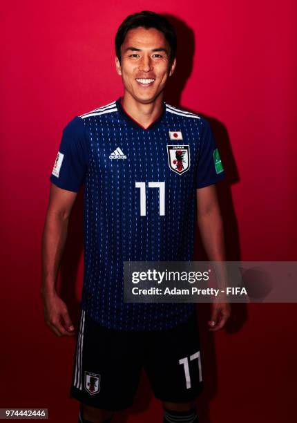 Makoto Hasebe of Japan poses for a portrait during the official FIFA World Cup 2018 portrait session at the FC Rubin Training Grounds on June 14,...