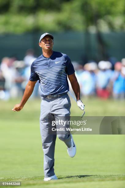 Tiger Woods of the United States reacts to his second shot on the fourth hole during the first round of the 2018 U.S. Open at Shinnecock Hills Golf...