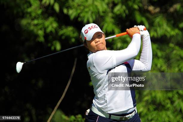 Ariya Jutanugarn of Thailand hits from the 8th tee during the first round of the Meijer LPGA Classic golf tournament at Blythefield Country Club in...