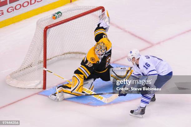 Tim Thomas of the Boston Bruins makes a save in a shootout against Jamie Lundmark of the Toronto Maple Leafs at the TD Garden on March 4, 2010 in...