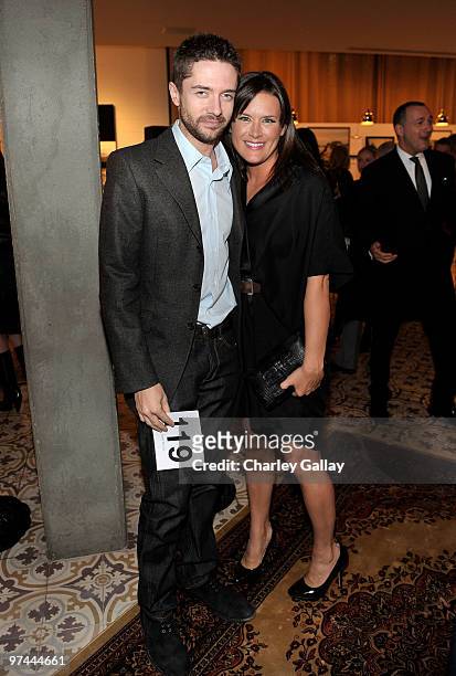 Actor Topher Grace and Art of Elysium founder Jennifer Howell attend Art of Elysium's "Pieces Of Heaven" presented by Vanity Fair and BMW held at...
