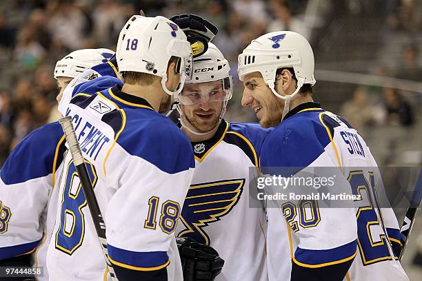 Center Alexander Steen of the St. Louis Blues celebrates his goal with Jay McClement and Carlo Colaiacovo in the second period against the Dallas...
