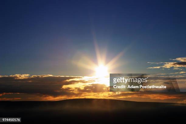 sunset over holcombe - adam ray stock pictures, royalty-free photos & images
