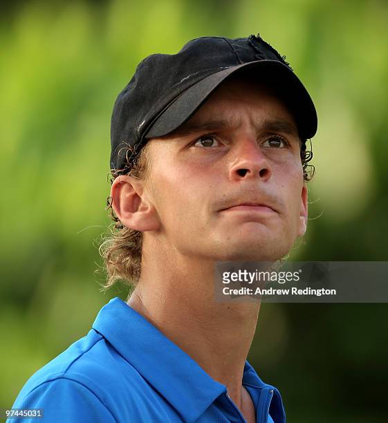 Joost Luiten of The Netherlands waits to play on the second hole during the the second round of the Maybank Malaysian Open at the Kuala Lumpur Golf...