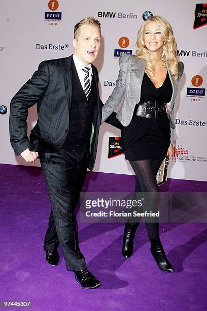 Host Oliver Pocher and girlfriend Sandy Meyer-Woelden arrive at the Echo Award 2010 at Messe Berlin on March 4, 2010 in Berlin, Germany.