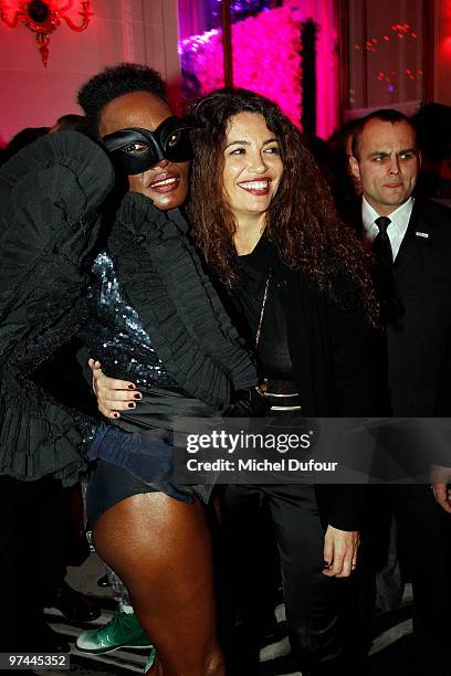 Grace Jones and Afef Jnifen attends the Victor & Rolf 'Flower Bomb' 5th Anniversary Party at Hotel Meurice on March 4, 2010 in Paris, France.