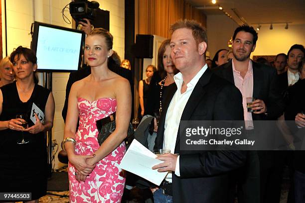 Actress Amy Smart and producer Ryan Kavanaugh attend Art of Elysium's "Pieces Of Heaven" presented by Vanity Fair and BMW held at Palihouse Holloway...