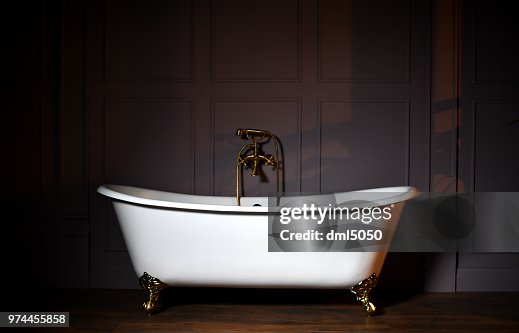 Beautiful classic style white claw foot bathtub with stainless steel old fashioned faucet and sprayer Beautiful classic style white claw foot bathtub with stainless steel old fashioned faucet and sprayer