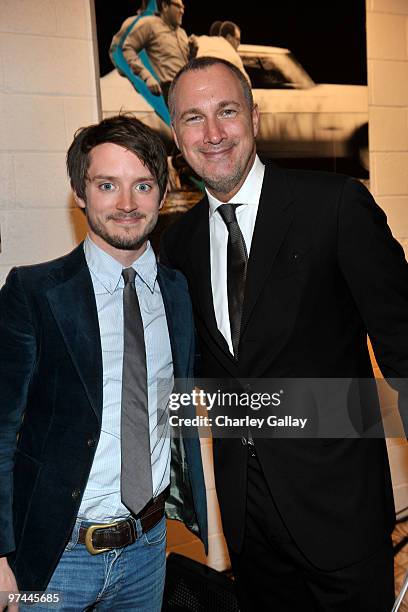 Actor Elijah Wood and Publisher of Vanity Fair Edward Menicheschi attend Art of Elysium's "Pieces Of Heaven" presented by Vanity Fair and BMW held at...