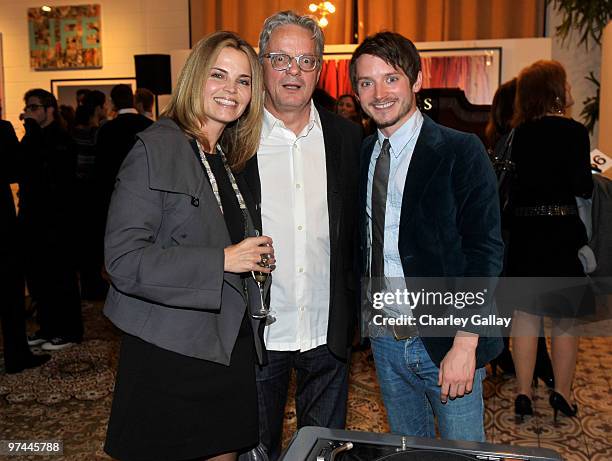 Anita Mothersbaugh, musician Mark Mothersbaugh, and actor Elijah Wood attend Art of Elysium's "Pieces Of Heaven" presented by Vanity Fair and BMW...