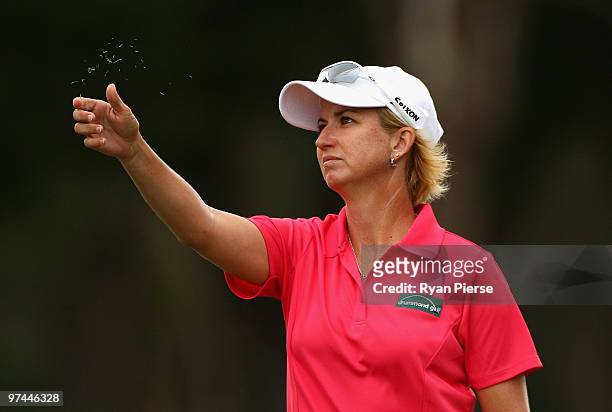 Karrie Webb of Australia checks the wind on the 4th hole during round two of the 2010 ANZ Ladies Masters at Royal Pines Resort on March 5, 2010 in...