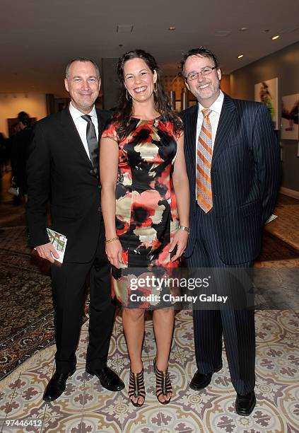 Vanity Fair publisher Edward Menicheschi and Jack Pitney with his wife attend Art of Elysium's "Pieces Of Heaven" presented by Vanity Fair and BMW...