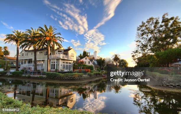 suburban houses near canal, venice, los angeles, california, usa - venice california fotografías e imágenes de stock