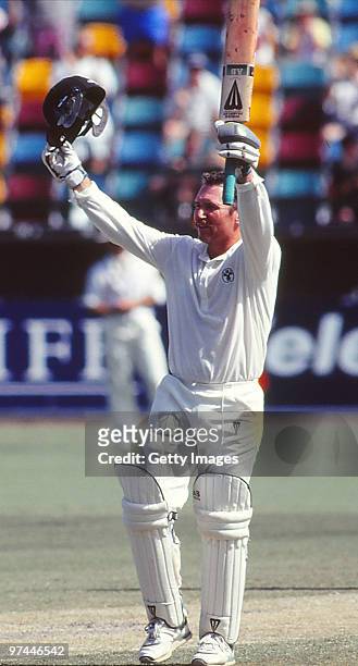 Allan Border of Australia celebrates in a Test match on December 4, 1993 in Australia.