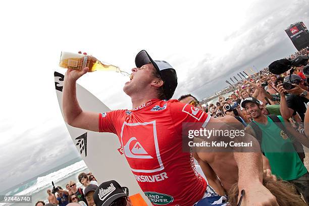 Taj Burrow of Australia celebrates after winning the Quiksilver Pro final against Jordy Smith of South Africa, the Quiksilver Pro 2010 is part of the...