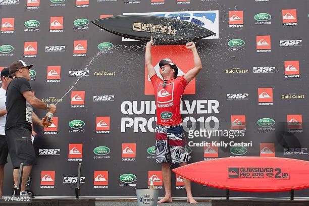 Taj Burrow of Australia celebrates winning the Quiksilver Pro final against Jordy Smith of South Africa, the Quiksilver Pro 2010 is part of the ASP...