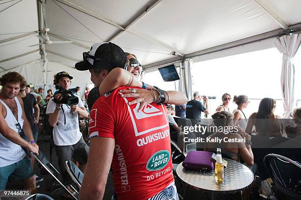 Taj Burrow of Australia is congratulated by his girlfriend after winning the Quiksilver Pro final against Jordy Smith of South Africa, the Quiksilver...