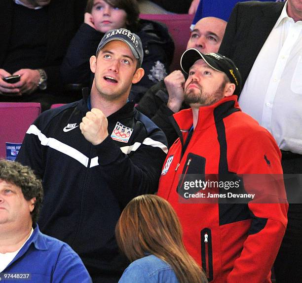 Justin Olsen and Steve Holcomb of the USA Olympic Bobsled team attends the Pittsburgh Penguins Vs New York Rangers game at Madison Square Garden on...