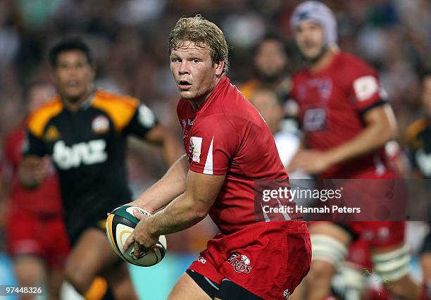 Daniel Braid of the Reds looks to pass during the round four Super 14 match between the Chiefs and the Reds at Waikato Stadium on March 5, 2010 in...