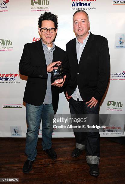 Director/producer/writer J.J. Abrams poses with the Oscar Wilde honorary Irishman award with cinematographer Seamus McGarvey during the 5th Annual...