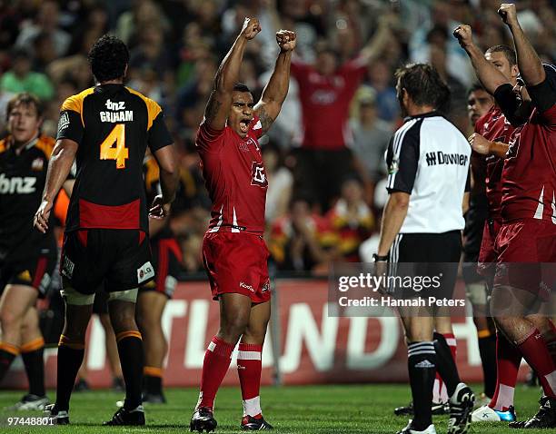 Will Genia of the Reds celebrates winning the round four Super 14 match between the Chiefs and the Reds at Waikato Stadium on March 5, 2010 in...