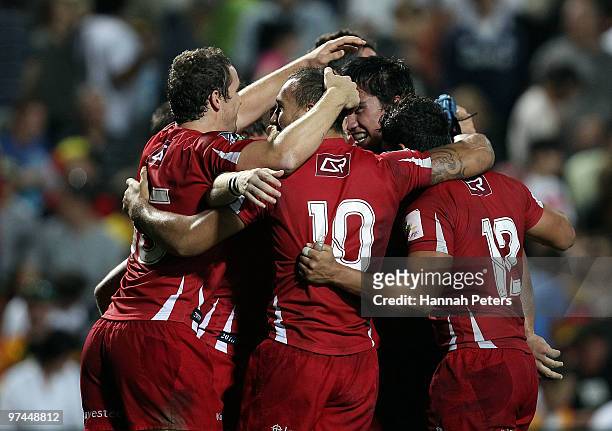 The Reds celebrate winning the round four Super 14 match between the Chiefs and the Reds at Waikato Stadium on March 5, 2010 in Hamilton, New Zealand.