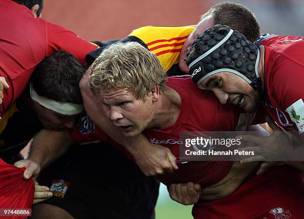 Daniel Braid of the Reds competes in the maul during the round four Super 14 match between the Chiefs and the Reds at Waikato Stadium on March 5,...