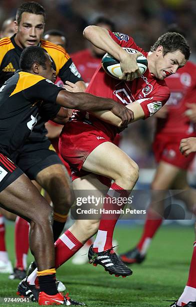 Luke Morohan of the Reds attacks during the round four Super 14 match between the Chiefs and the Reds at Waikato Stadium on March 5, 2010 in...