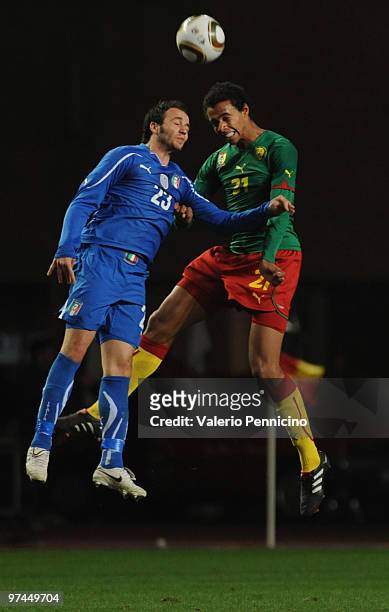 Giampaolo Pazzini of Italy clashes with Joel Matip of Cameroon during the International Friendly match between Italy and Cameroon at Louis II Stadium...