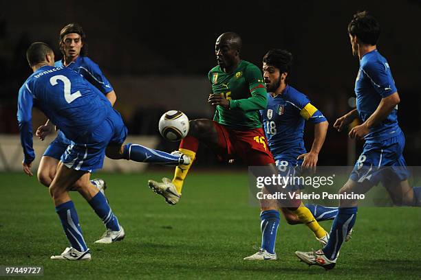 Achille Webo of Cameroon is challenged by Leonardo Bonucci of Italy during the International Friendly match between Italy and Cameroon at Louis II...