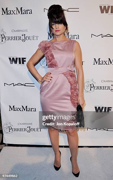 Actress Mena Suvari arrives at the 3rd Annual Women In Film Pre-Oscar Party at a private residence on March 4, 2010 in Los Angeles, California.