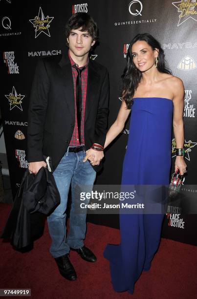 Actor Ashton Kutcher and actress Demi Moore arrive at the Hollywood Domino's 3rd annual pre-Oscar Hollywood gala on March 4, 2010 in Beverly Hills,...