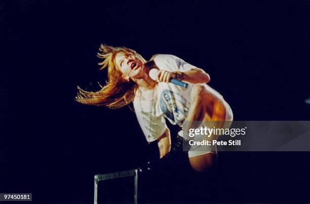 Axl Rose of Guns n' Roses performs on stage at Wembley Stadium on August 31st, 1991 in London, England.