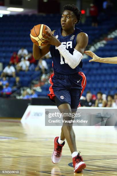 Ayo Dosunmu of the United States passes the ball during the first half of a FIBA U18 Americas Championship group phase game against Puerto Rico at...