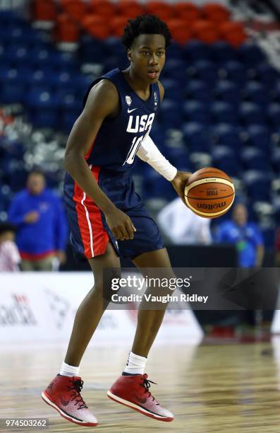 Ayo Dosunmo of the United States dribbles the ball during the second half of a FIBA U18 Americas Championship group phase game against Puerto Rico at...