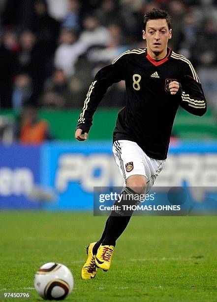 Germany's midfielder Mesut Oezil controls the ball during the friendly football match Germany vs Argentina in the southern German city of Munich on...